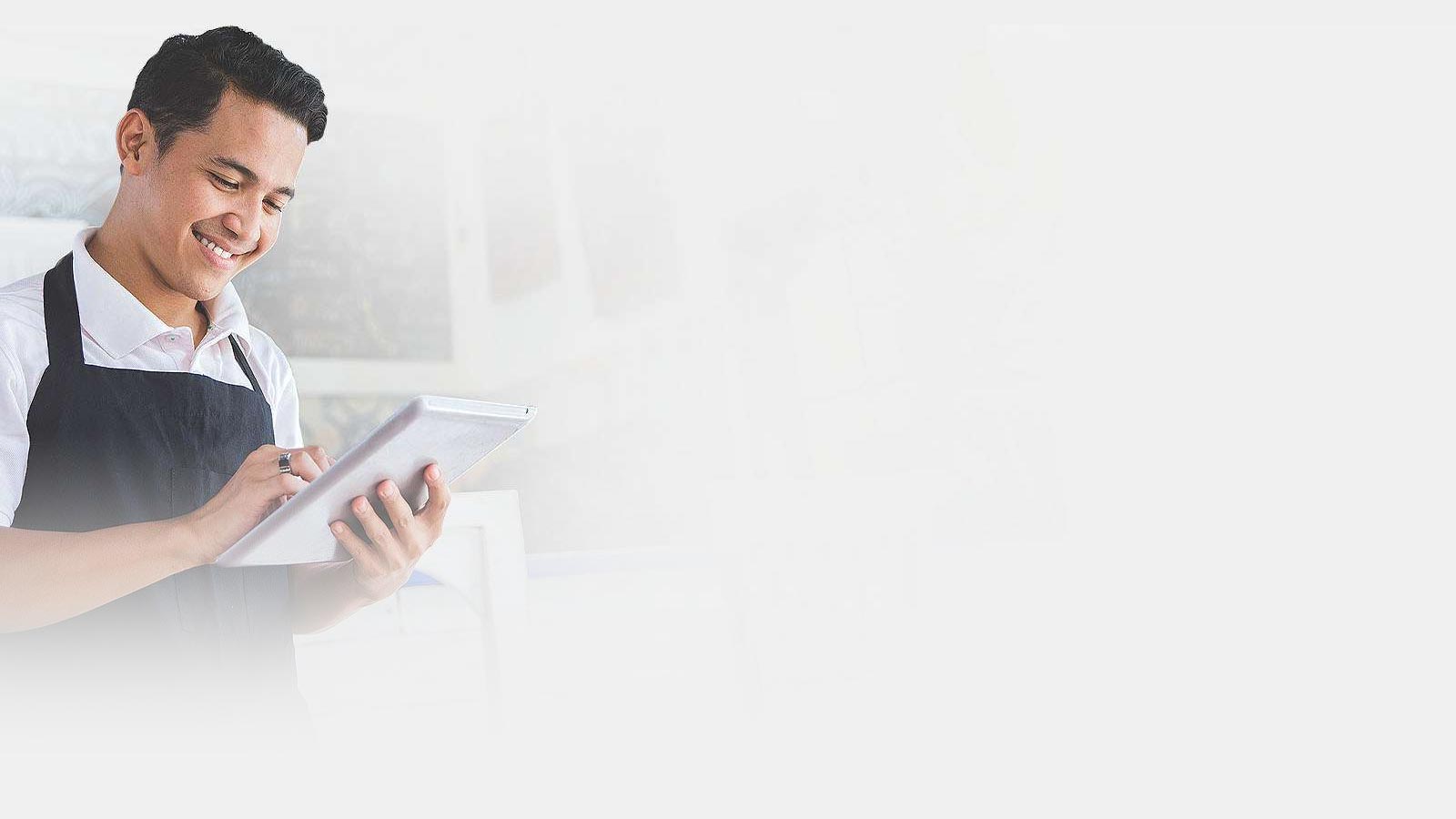 Business man standing with ipad
