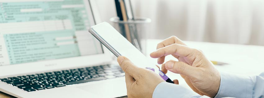 Man in front of a laptop