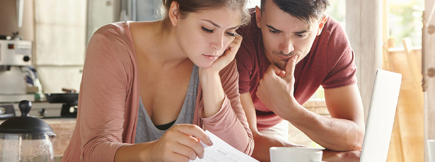 Couple looking at their finances