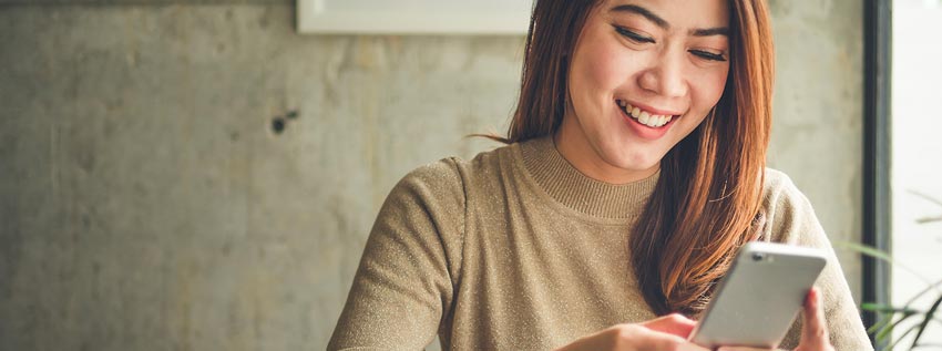 Woman looking at her cell phone