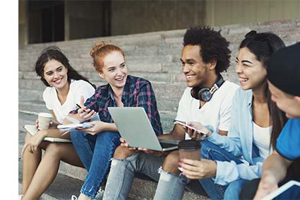 Group of students working with each other