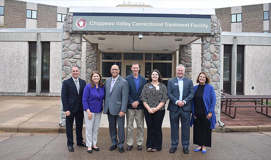 Photo of RCU group in front of correctional facility