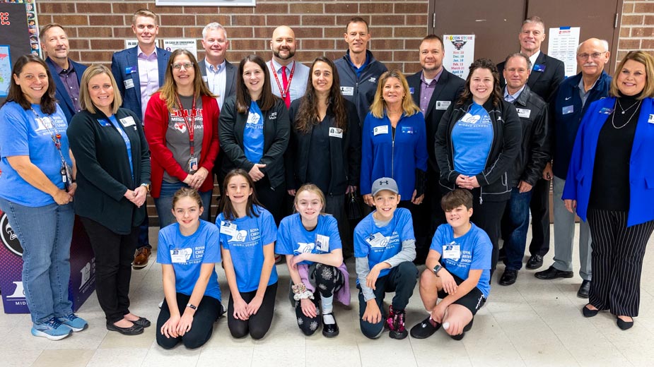 Large group photo of Members, teachers and volunteers