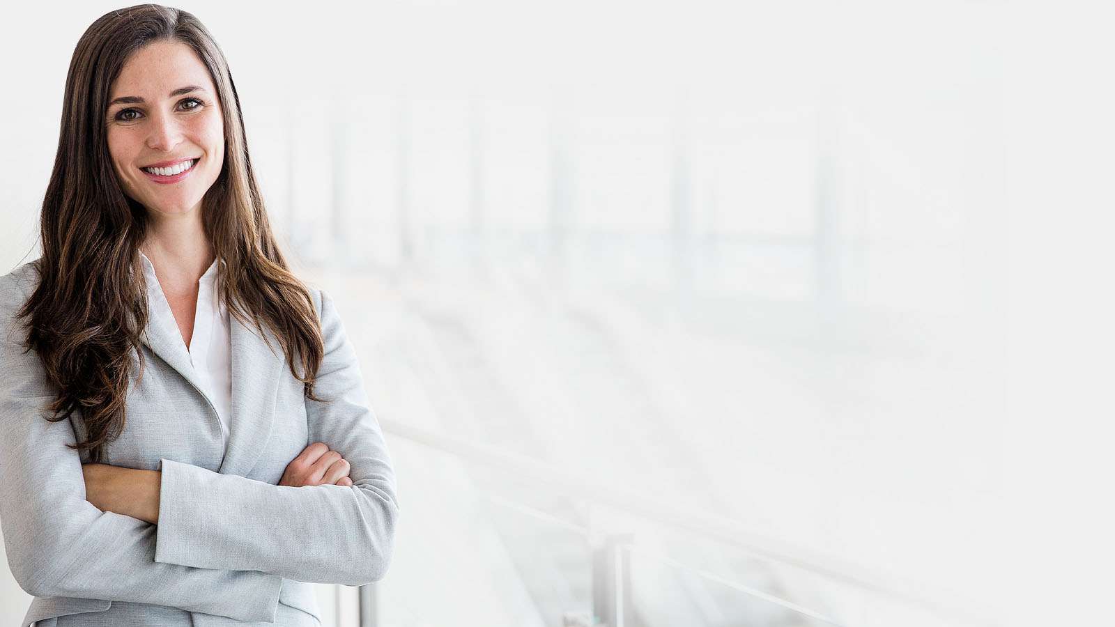 Woman standing with her arms crossed