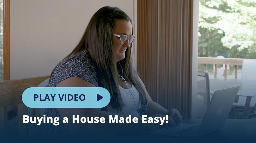 Woman looking at her mortgage payment on a laptop