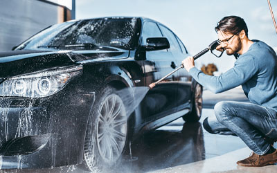 Man washing his car