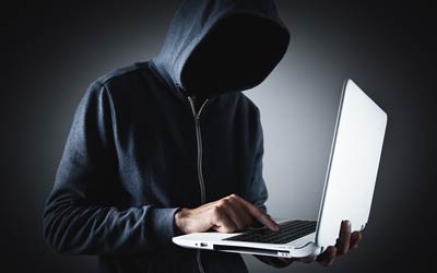 Computer Hacker and laptop