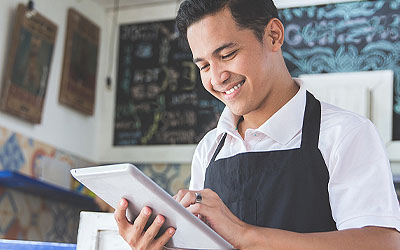 Business man looking at tablet