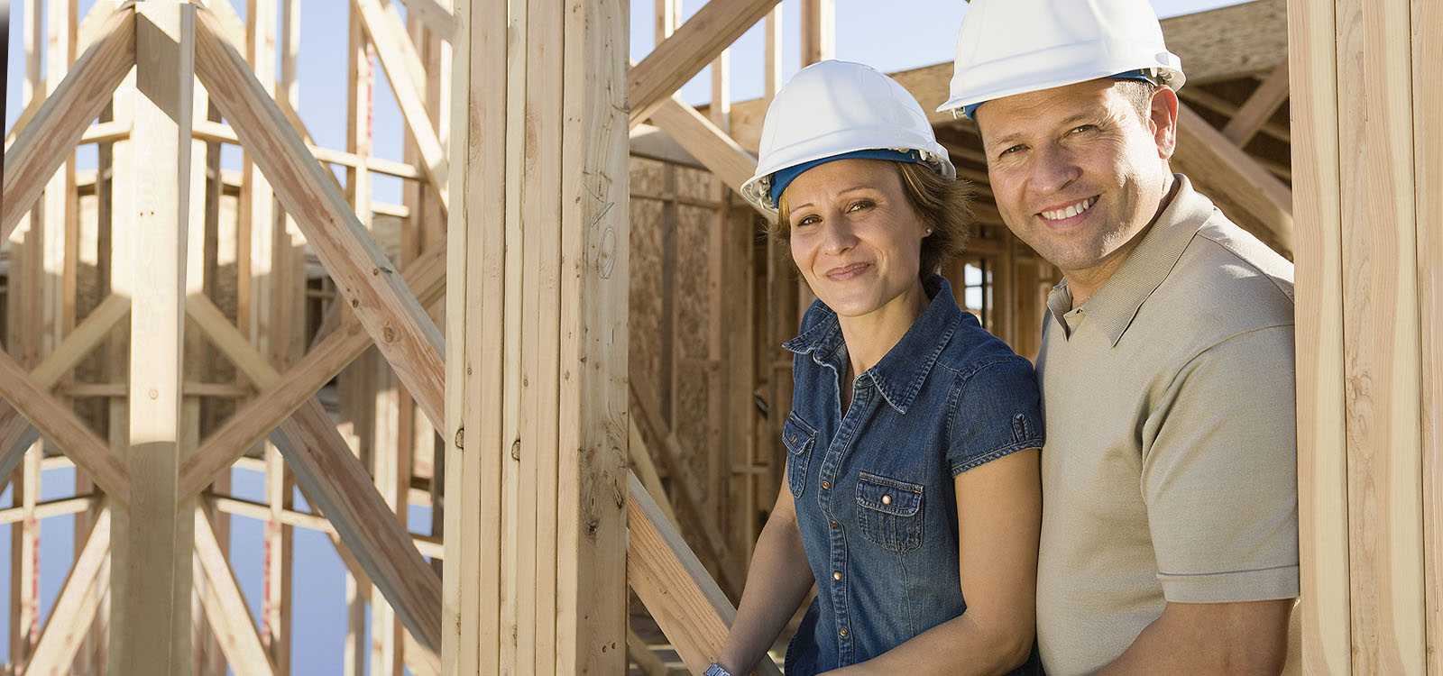 man and woman at construction site