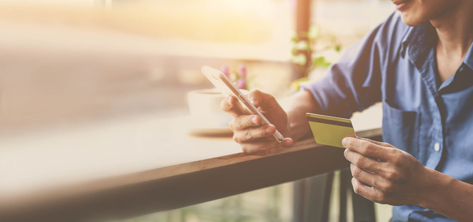 man with credit card and smartphone