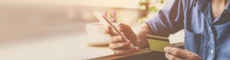 man with credit card and smartphone