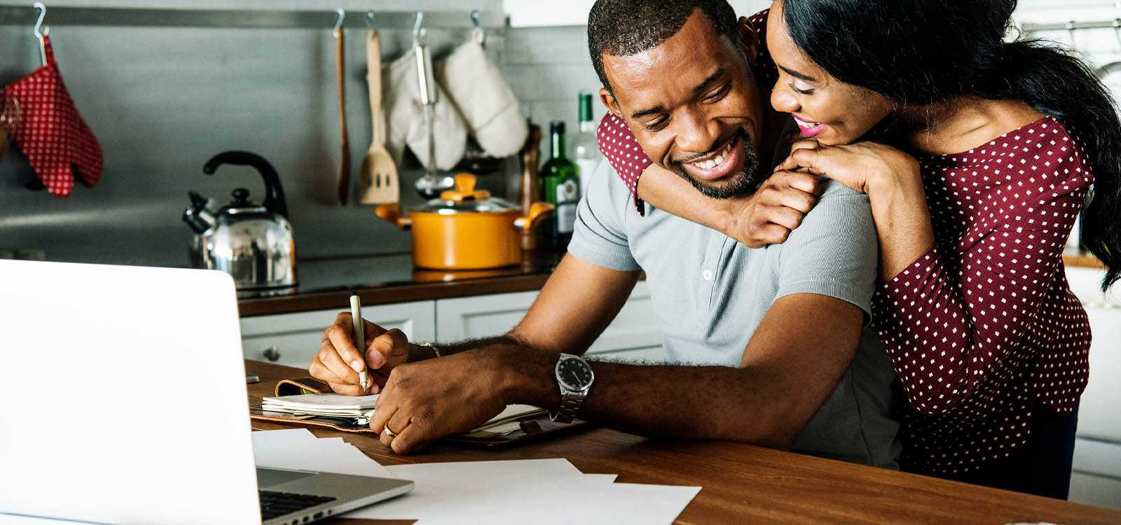 man and woman in kitchen