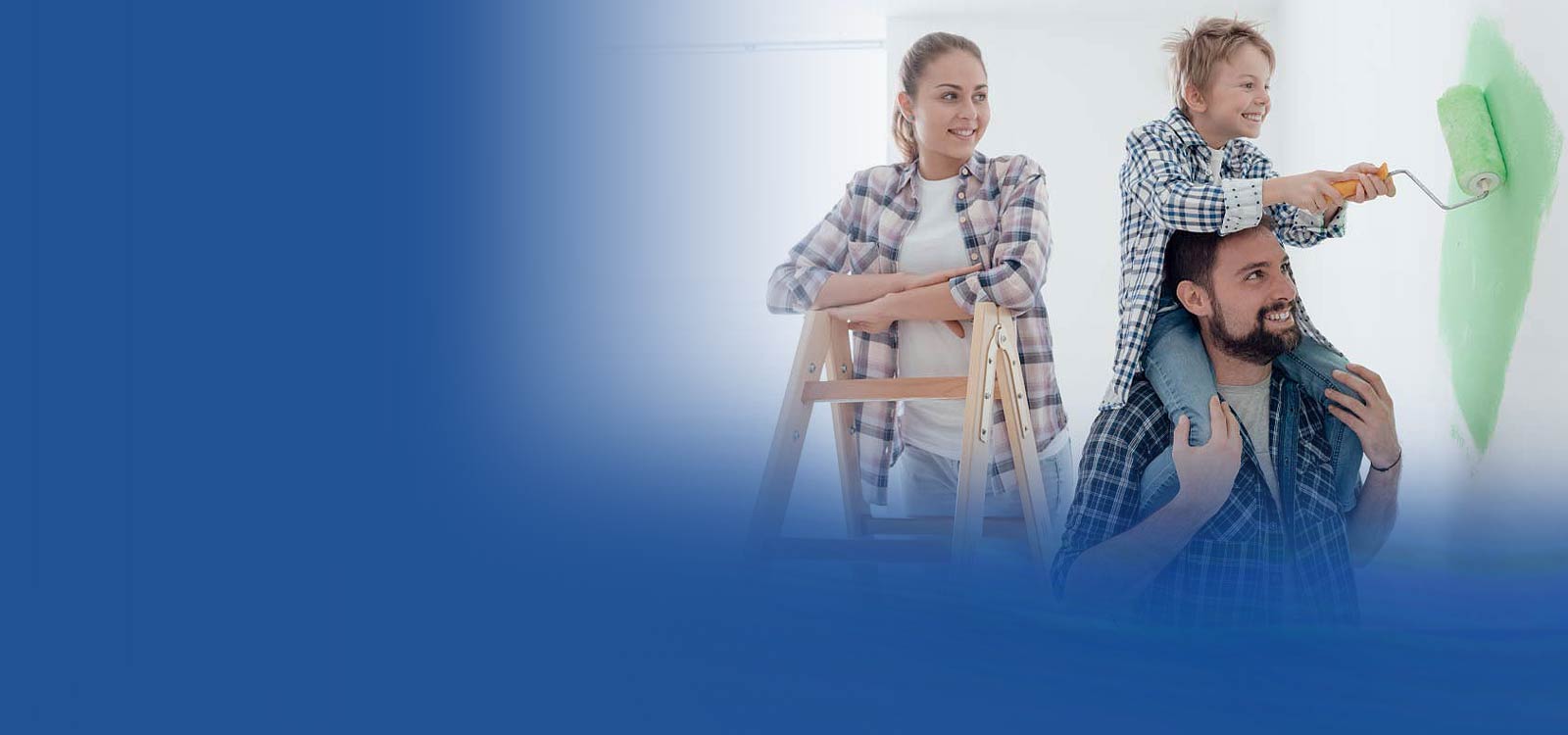 Family working together and painting a room