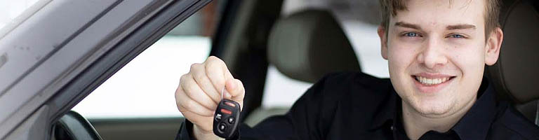 Man holding keys of new car