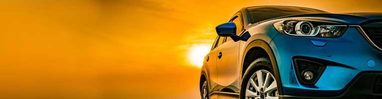 new car at sunset