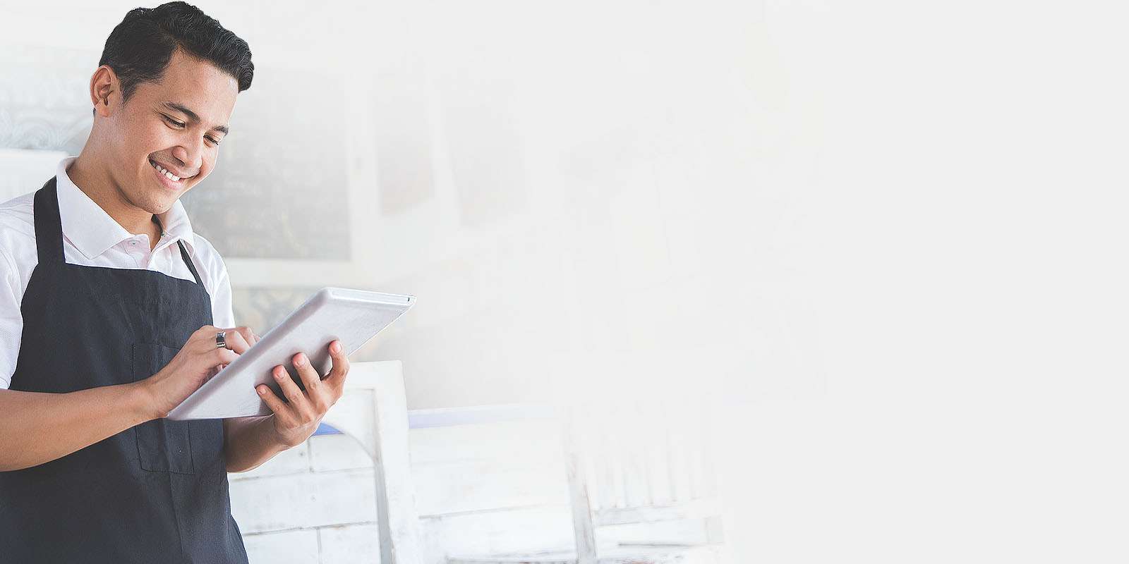 Business Owner holding tablet