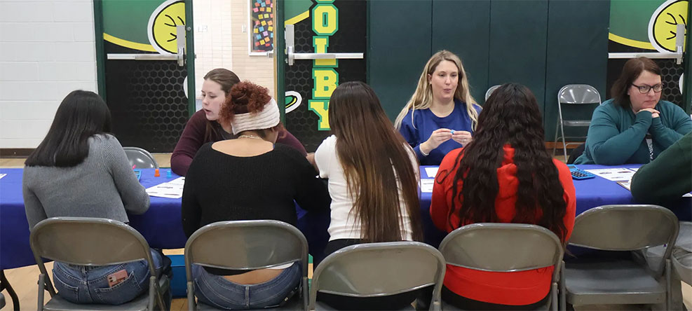 Group of students learning about finances at Test Drive