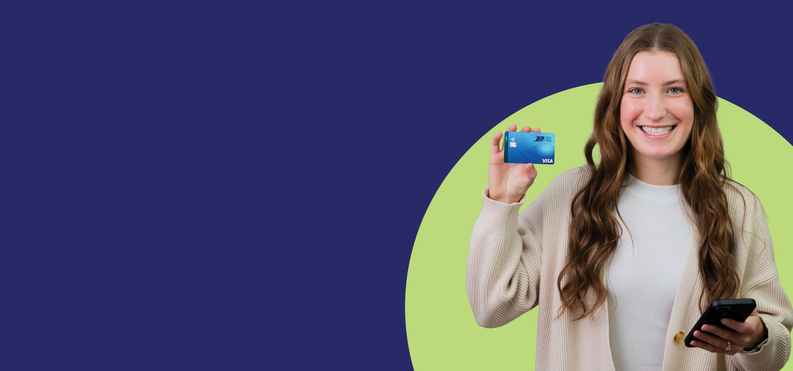 Young Royal Member holding a debit card