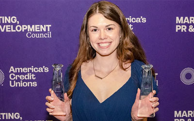 Photo of Journie holding the Diamond Awards