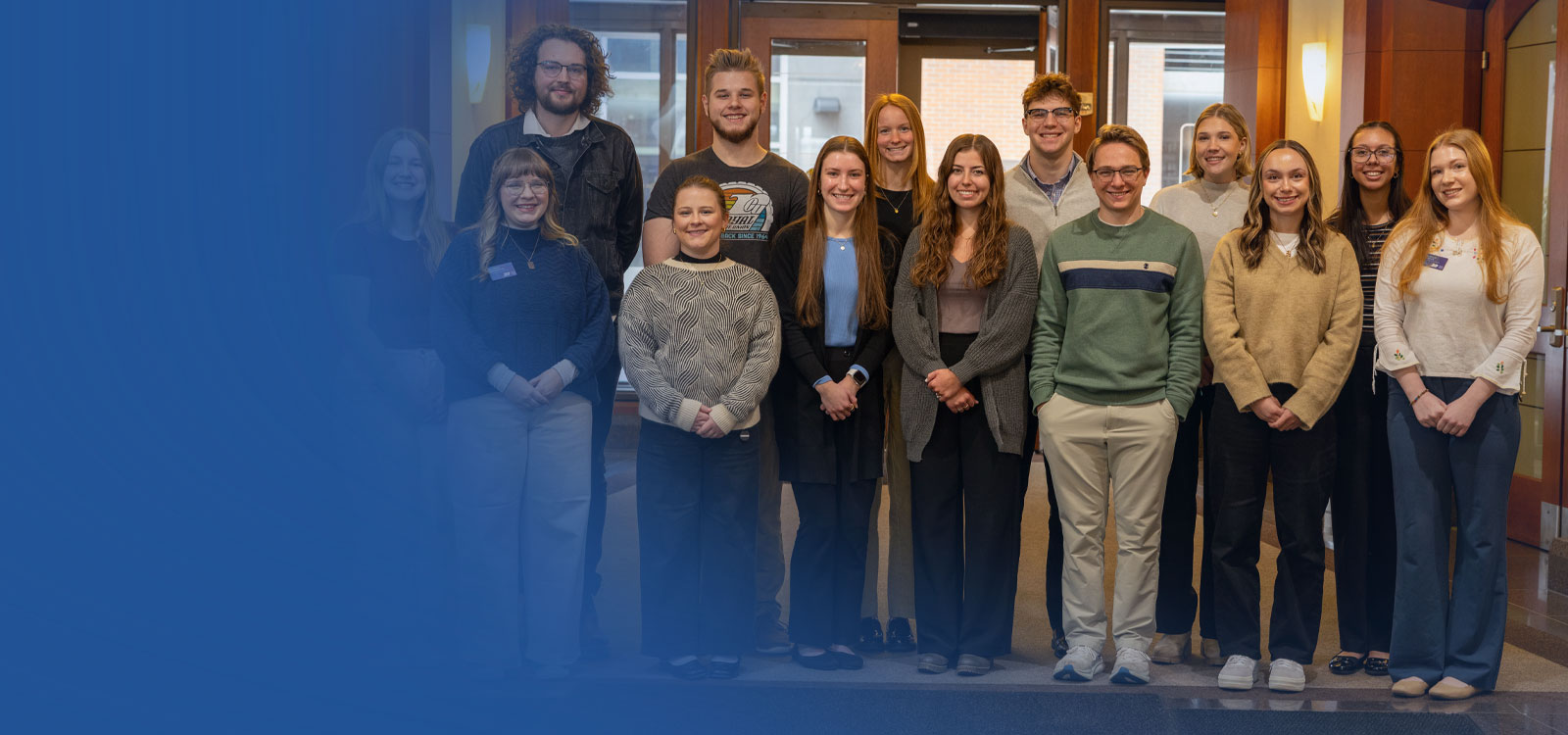 Group of interns standing in front of our main office