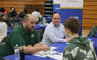 Group of students learning about finances at a Test Drive Event