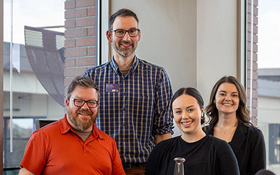 Photo of team of Money Donuts podcasters