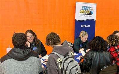 Group of students and staff at the Test Drive event