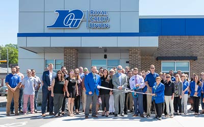 Group of RCU team standing in front of the new office