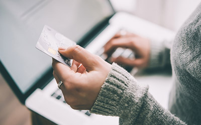 Person holding credit card