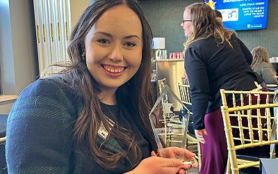 Person holding award