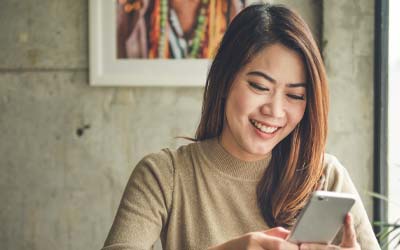 Woman looking at her mobile device