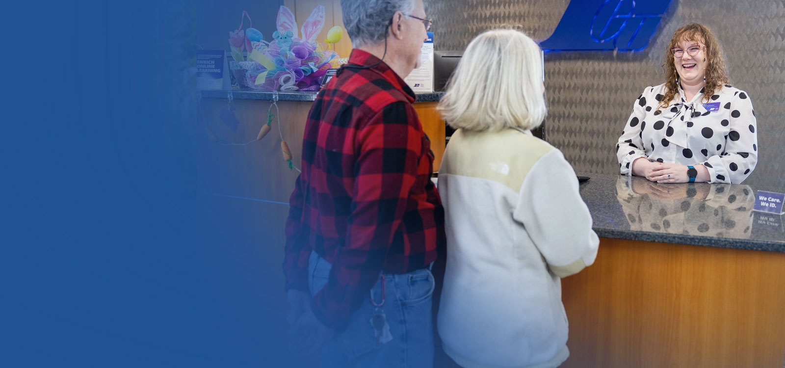 Royal Team Member working with a two people in an office