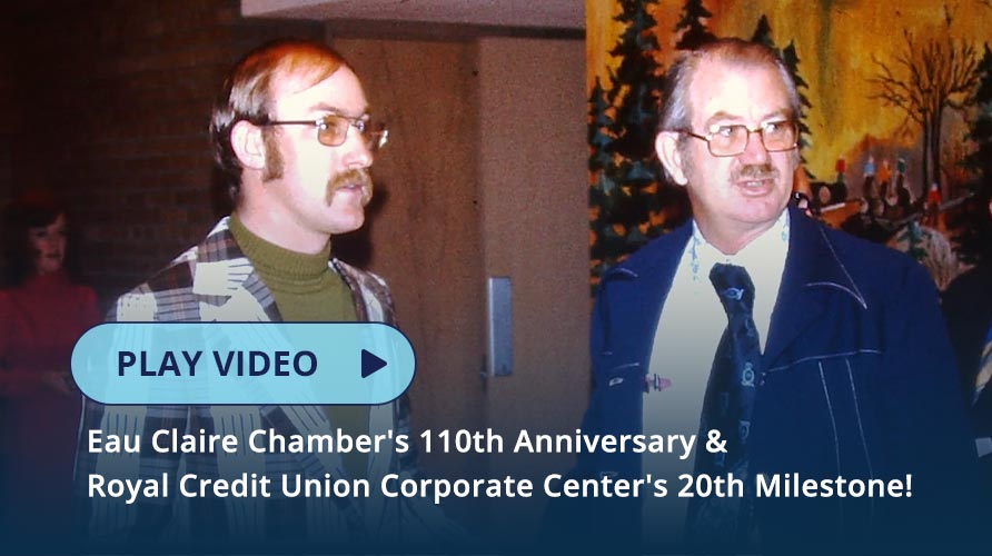 Photo from the anniversary event of two older men talking