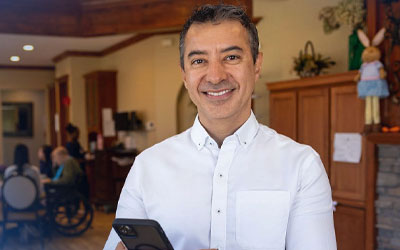 Royal Member on his cell phone