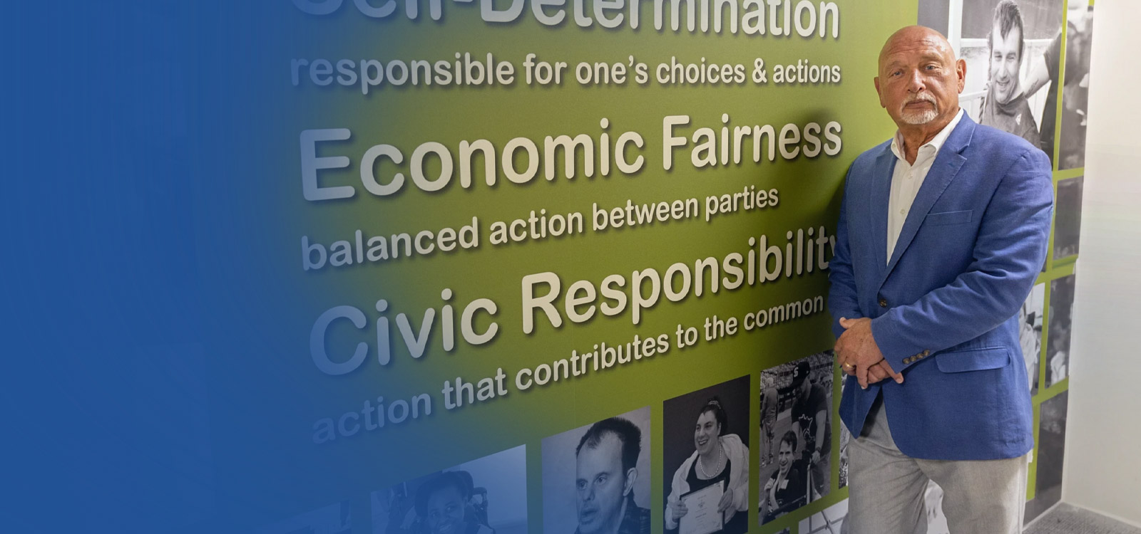 Business person standing in front of his non profit sign