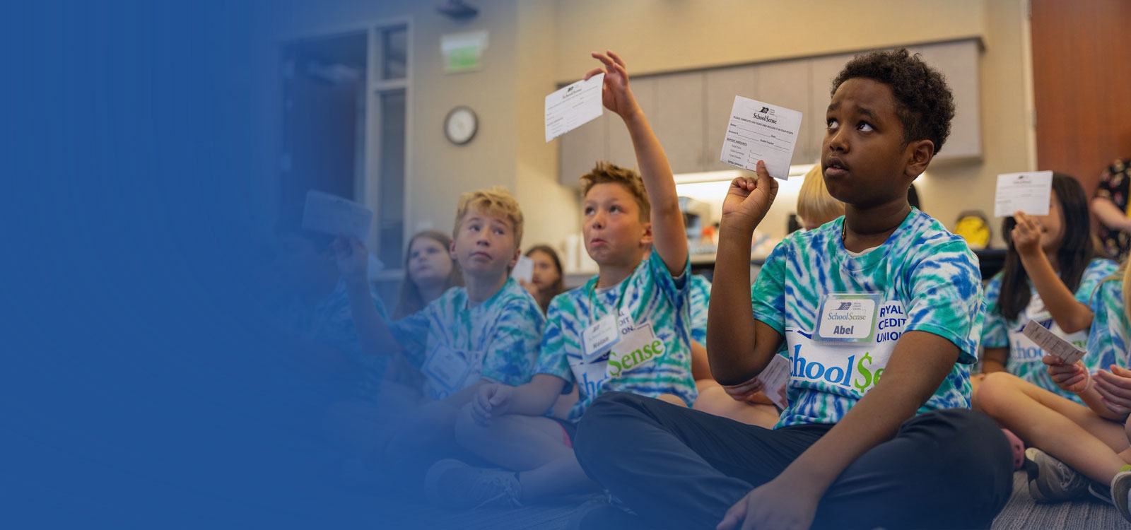 kids working with RCU to learn about finances