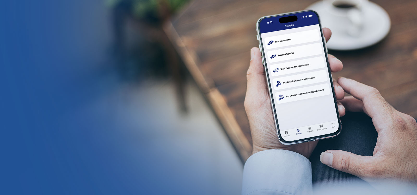 Person using phone to mobile bank