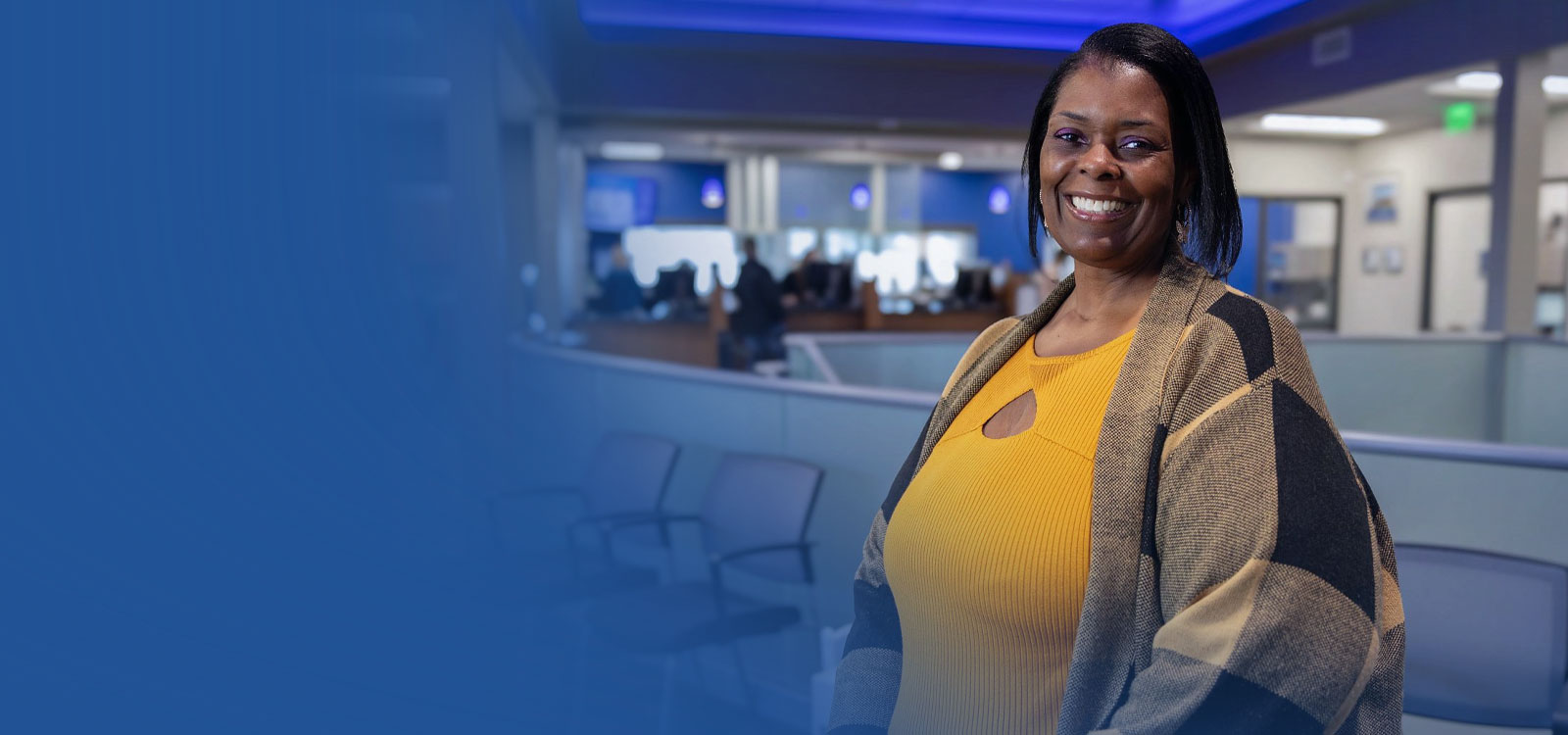 Smiling woman inside an RCU Office
