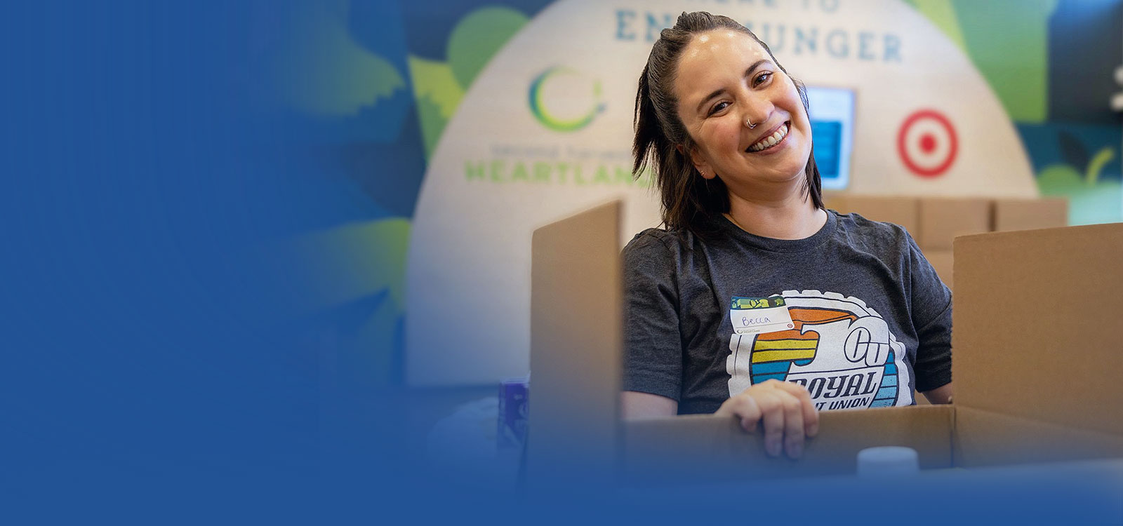 Royal Team Member Volunteer working at a food shelf