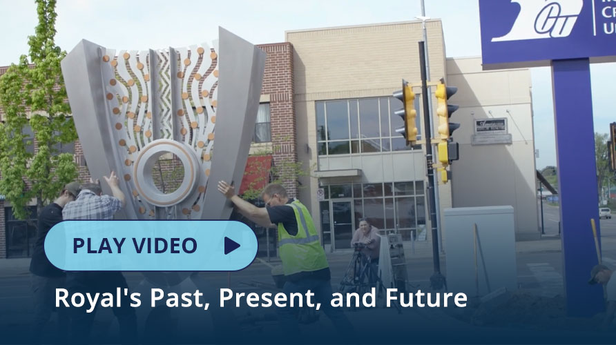 Team of people installing a sculpture at a Royal Office
