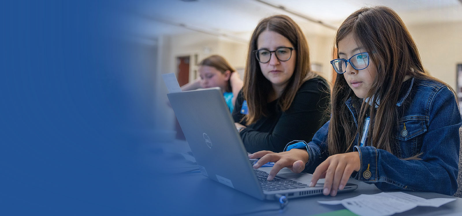 Student and School Sense teacher working together