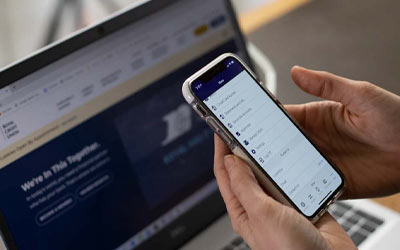 Person business banking on mobile phone