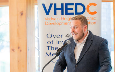 Cody speaking at the VHEDC event