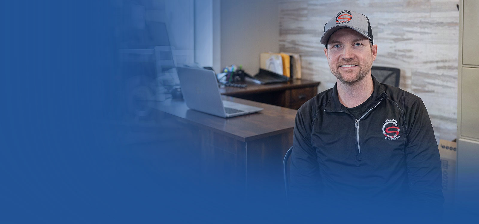 Local businessman inside his auto shop