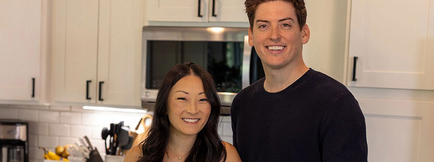 Happy husband and wife in the kitchen