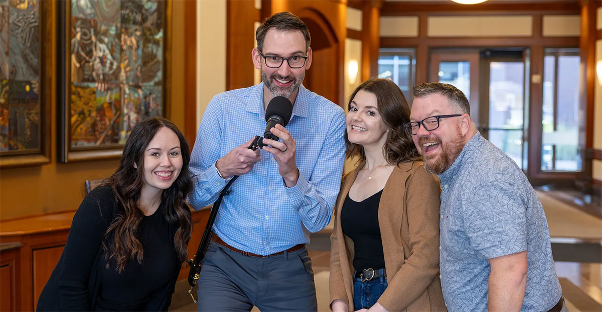 Money Donuts team posing for a photo