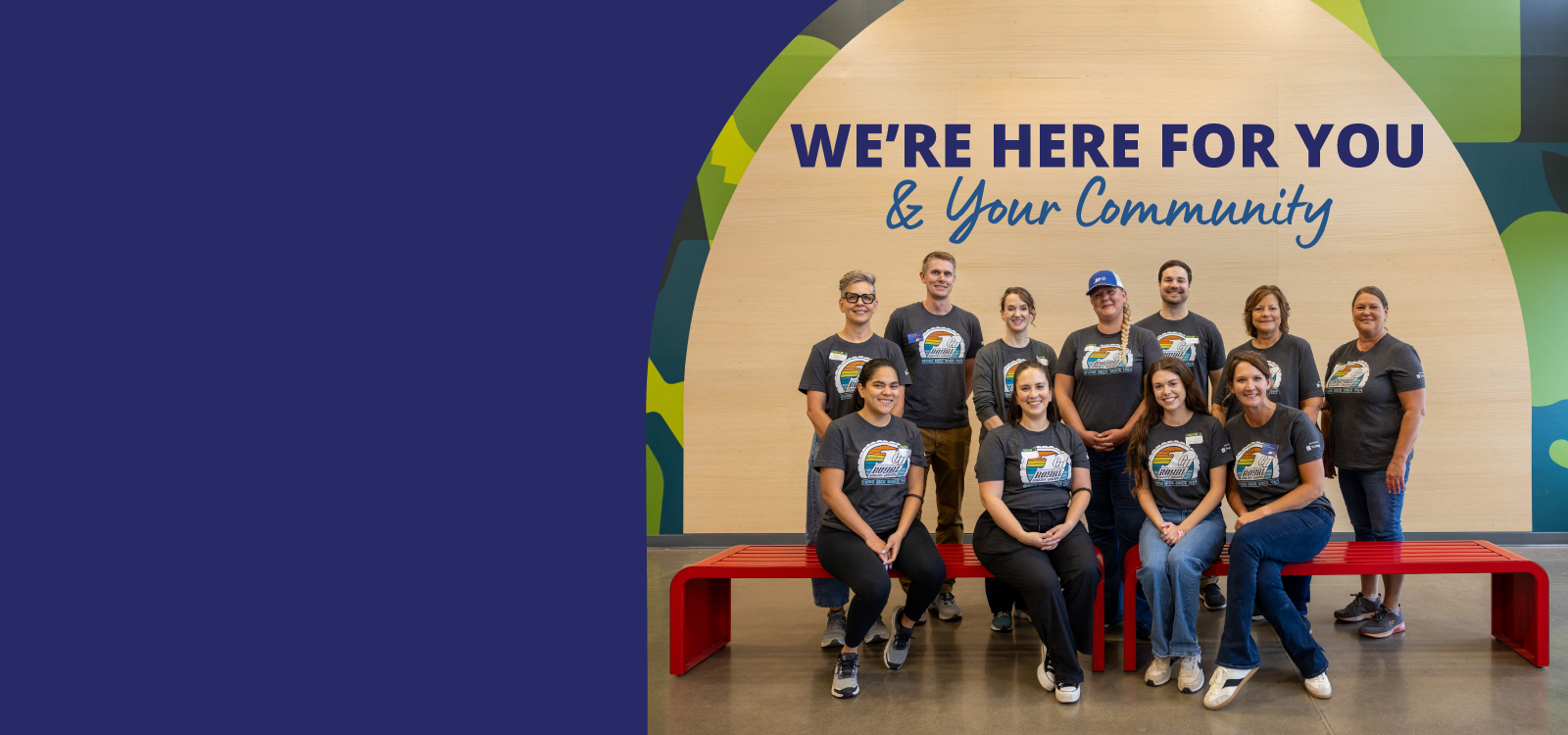 Image of a young man holding an RCU debit card