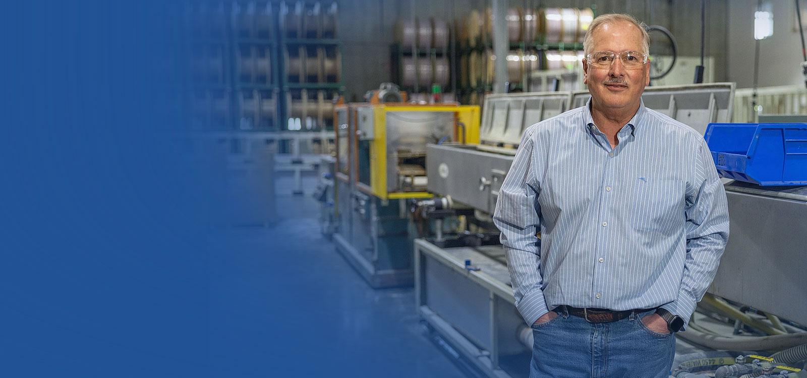 Business owner standing in his new work shop