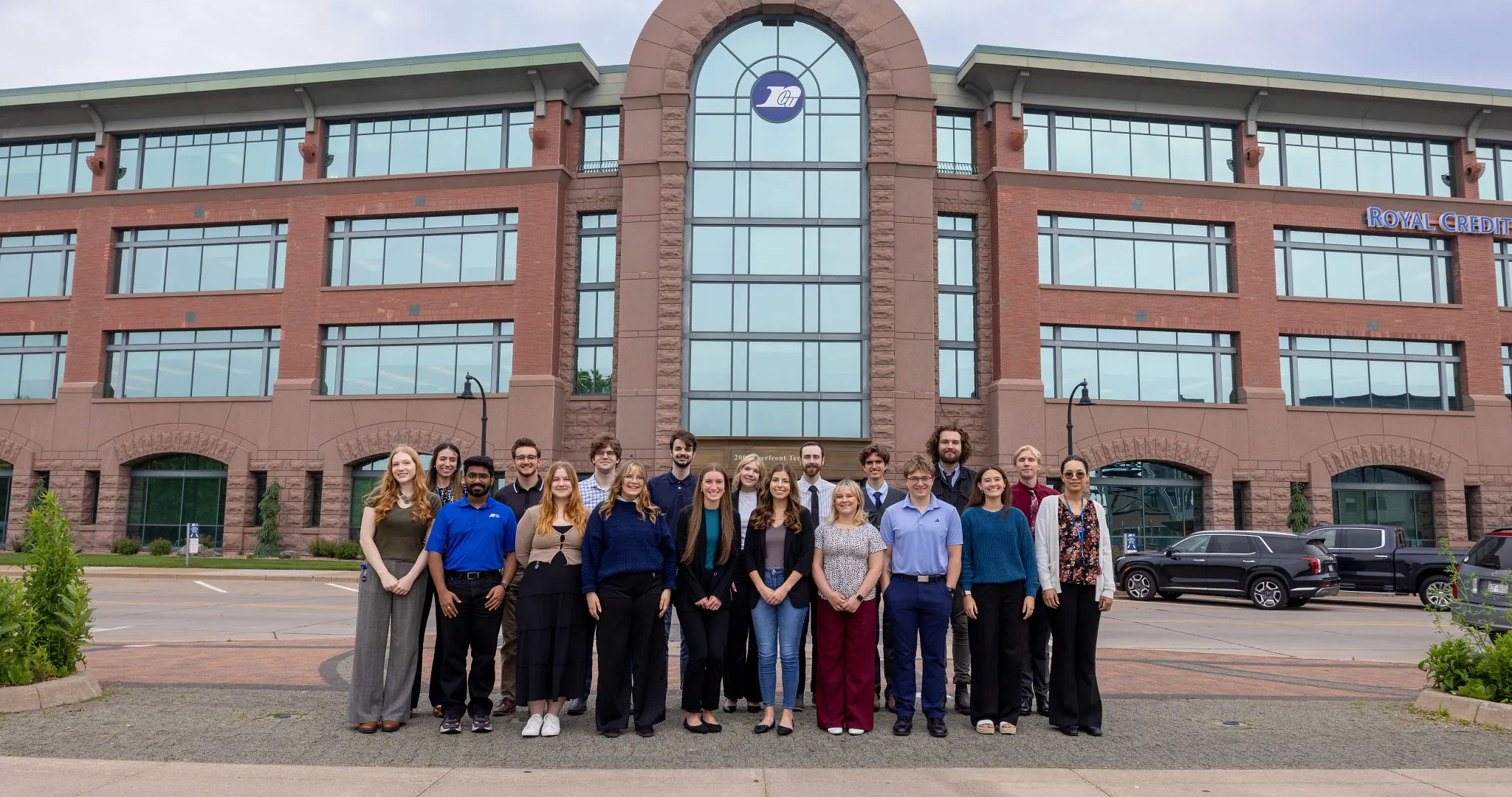 Students standing in front of the RCU headquarters