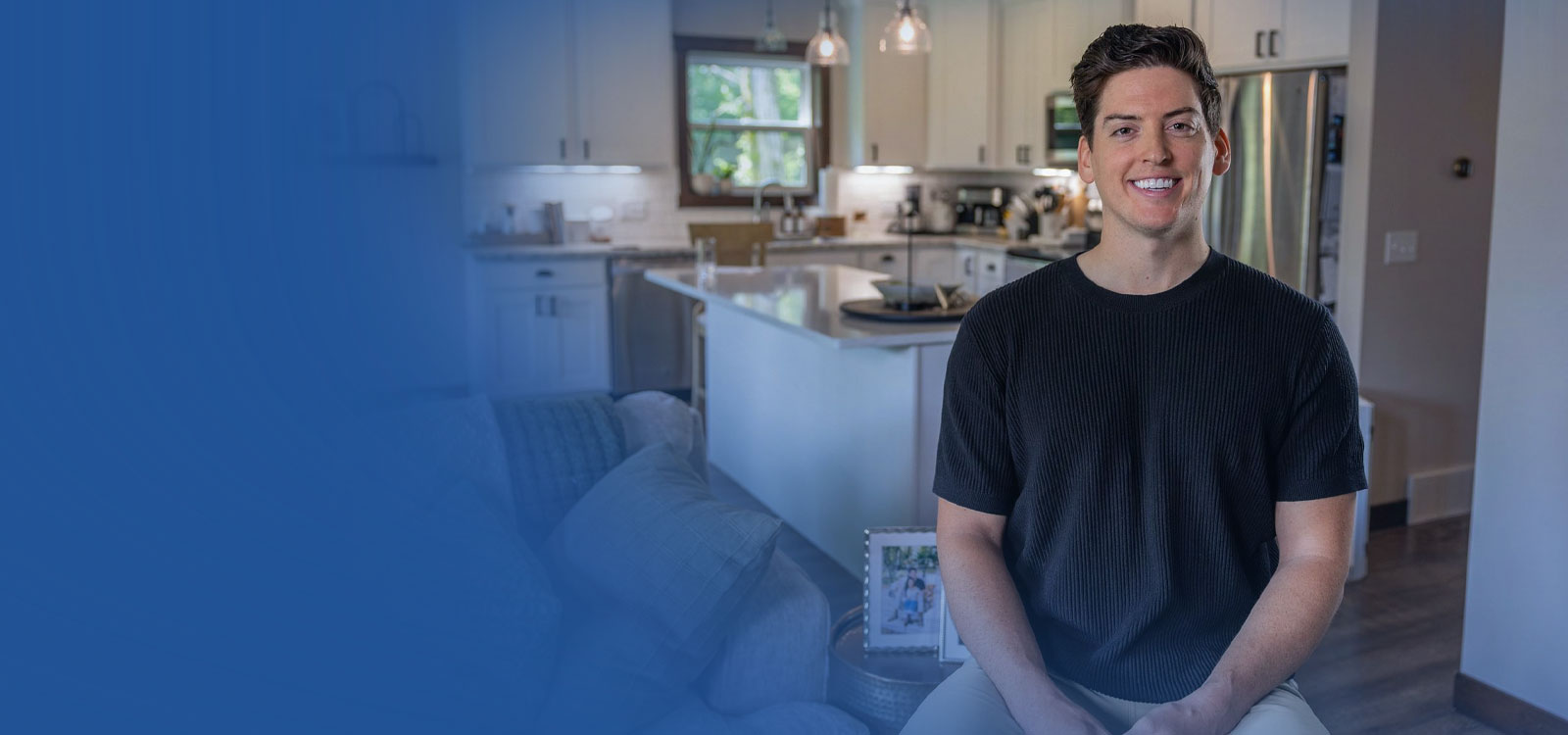 Royal Member standing in his kitchen
